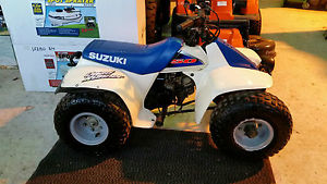 Suzuki LTZ 50 QUAD RUNNER / BIKE. SUITABLE FOR 6 - 12 YEAR OLDS, GOOD CONDITION