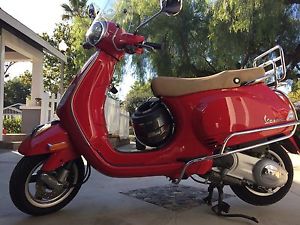 Vespa LX150 Red - 2013. Perfect condition, with windshield & rack, only 500mi