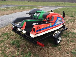 1996 Kawasaki Stand Up Skis And Trailer