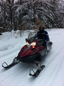 Polaris 700 Touring snowmobile with enclosed Timber Wolf Trailer