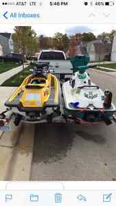two jetskis and trailer