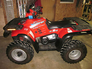 1995 POLARIS XPLORER 2 STROKE 4X4 WITH PLOW, WINCH LOW HOURS AND, NICE SHAPE!