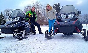 Two Arctic Cat Turbo 660 4 cycle Sleds and Enclosed Triton Elite Trailer