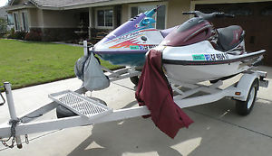 2 Jet Skis, Polaris SLT 780, Yamaha Wave Runner GP 760, Double Ski Trailer