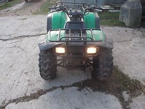 KAWASAKI 300 KLF , FARM QUAD 5 SPEED +REVERSE.GOOD CONDITION.