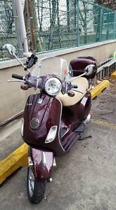 Beautiful, Daring Plum 2012 Vespa LX150