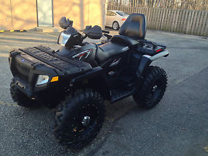 CLEAN  POLARIS SPORTSMAN TOURING 2 UP DELUXE STEALTH BLACK ,BLACK RIMS AND TIRES