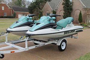 2 2001 Seadoo Wave Runners with Trailer and Covers 