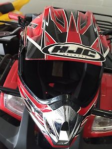 Two Bashan Atvs 110cc, Black Trailer, and Two Children's Motocross helmets
