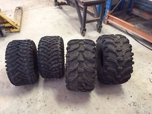 Kenda bear claw tires 2 of 25 x 12 and 2 of 22 x 11