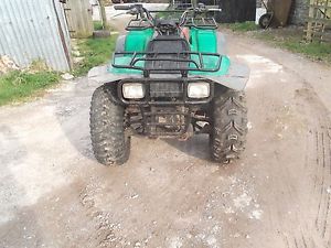 KAWASAKI 300 KLF , FARM QUAD 5 SPEED +REVERSE.GOOD CONDITION.