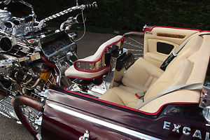 Stunning show trike,driven on a car licence no helmets required.Jaguar, no swap?