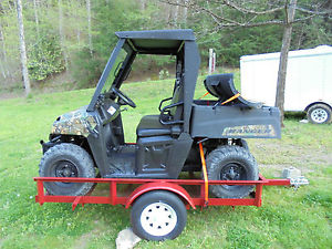 Polaris Ranger 2011 4x4 with plow blade and trailer