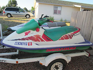 1996 Sea Doo and 1993 Tigershark jet ski's-with trailer!