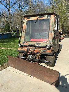 Kawasaki Mule 2510 ATV w/plow, extra tires, and spare engine for parts