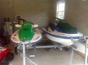 Pair of jet skis with trailer no reserve