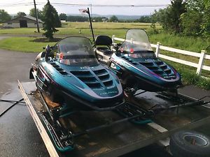 2 Polaris Snowmobiles with trailer