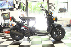 2014 Honda Ruckus Black, Showroom Condition only 1100 miles Gorgeous and New !!