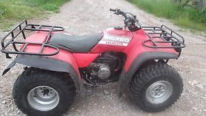 HONDA 300 TRX 4X4, BIG RED FARM QUAD 5 SPEED +REVERSE, GOOD CONDITION.