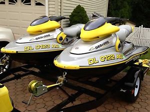 Matched Pair of 2001 XP Sea-DOO JetSkis with Matching Custom Trailer
