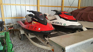 2 Seadoo's with double trailer