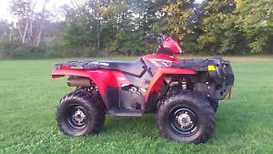 2010 Polaris Sportsman 500 HO 4X4 With Plow & Brushguard. Excellent Condition