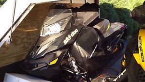 2 SKIDOO SLEDS WITH TRAILER