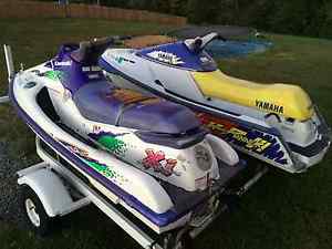 Yamaha and Kawasaki skis and trailer