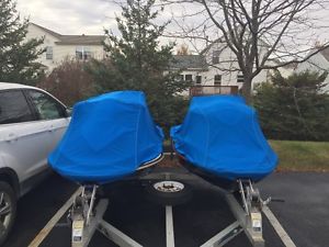 2 jet skis and trailer