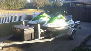 2003 and 2004 Kawasaki Ultra 150 Jet Skis Excellent Condition and Double Trailer