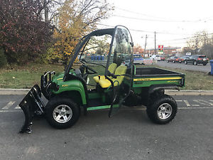SNOW ON THE WAY  JOHN DEERE GAS  ,FULLY INCLOSED,HEATED ,PLOW,SIGNALS LOW HOURS