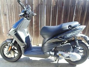 2015 Piaggio Typhoon Fly 50 scooter -2,757 miles, gets 144 MPG, runs great