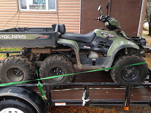 2008 Polaris Sportman 500 6x6. Atv. W/ Plow kit.