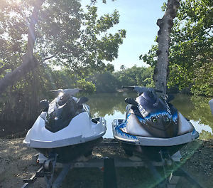 2011 and 2010 PACKAGE DEAL (2) Yamaha VX Deluxe Jetskis and Trailer
