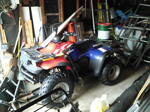 Polaris Magnum 325 4x4 ATV with Plow