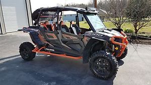 2014 POLARIS RZR XP EPS 1000 4 SEATER EPS LOW HOURS. TONS OF EXTRAS. WARRANTY