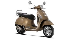 2013  Vespa 300ie scooter. Like new condition, rare gold/bronze color