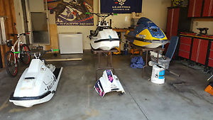 Kawasaki 650cc X2's and stand-up.  With trailer