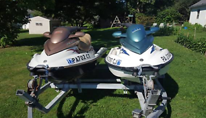 2001 and 2004 jet skis+ trailer