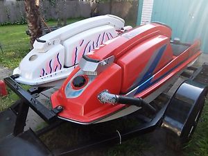 TWO Kawasaki JS 550 Stand up Jet Skis with trailer 1984 & 1987 one owner!